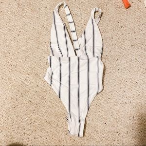 Striped one piece. Cross-back swim suit.